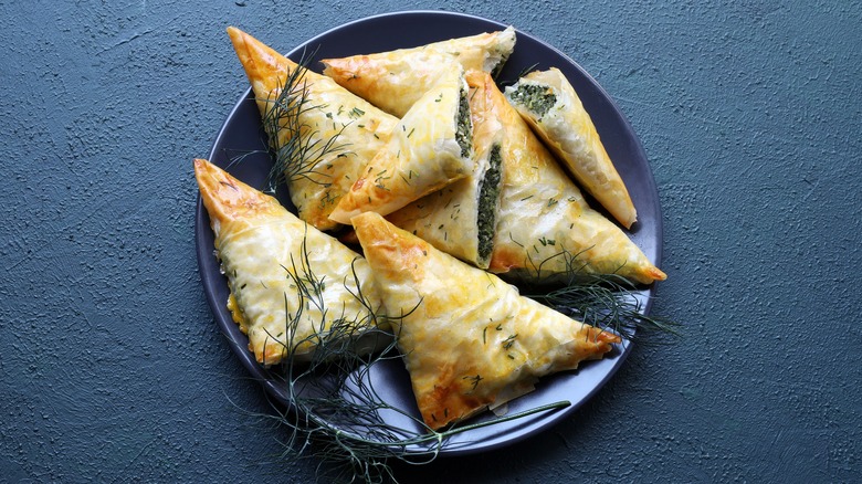 spinach pita on blue plate