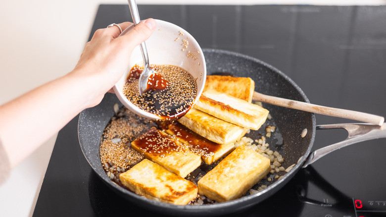 tofu with sauce in pan