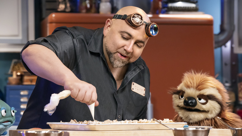 Duff Goldman and puppets on set of Duff's Happy Fun Bake Time