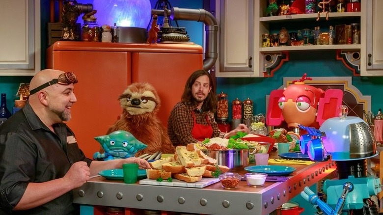 Duff Goldman and puppets on set of Duff's Happy Fun Bake Time