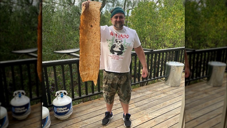 Duff Goldman holding a sangak