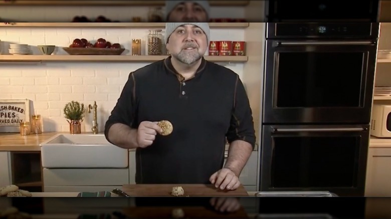 A screen shot of Duff Goldman on First Coast News making his "truce cookie"