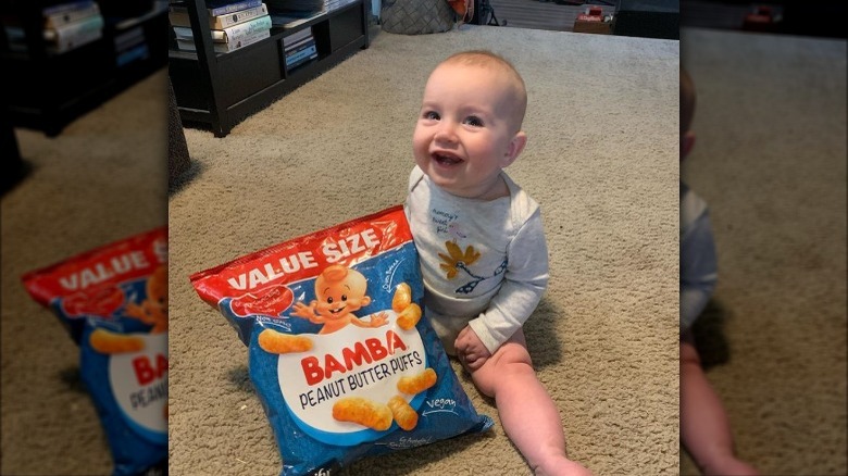 Duff Goldman's daughter with bag of Bamba