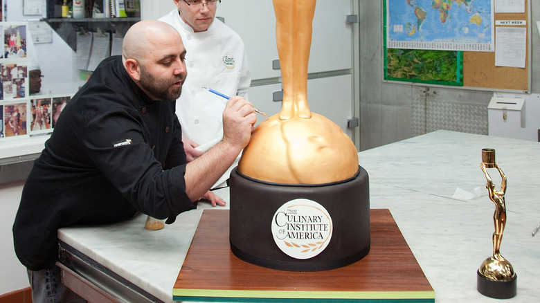 Duff Goldman decorating giant cake