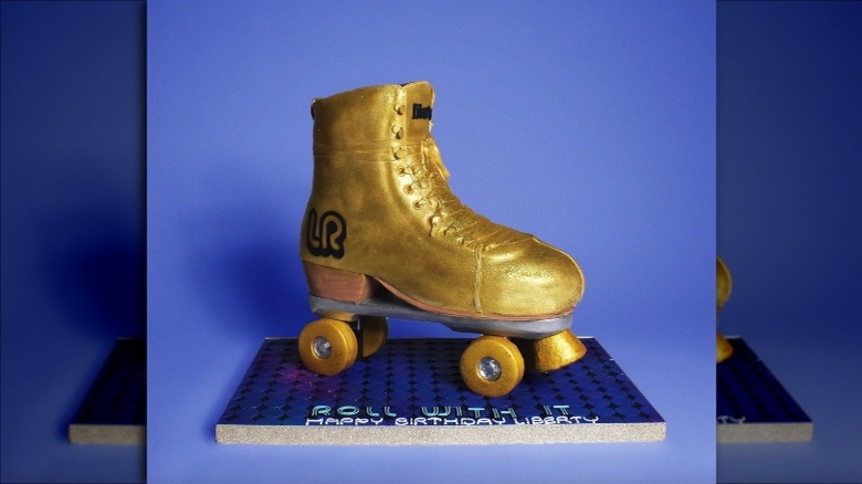 Golden roller skate cake creation