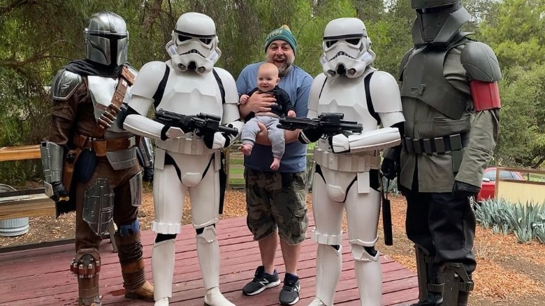 Duff Goldman posing with his daughter and Storm Troopers