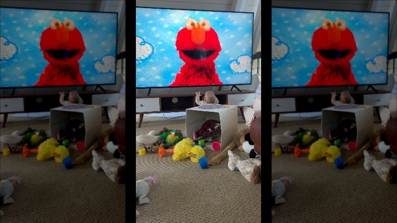 Josephine Goldman dancing to Elmo on TV