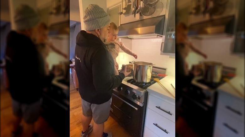 Duff Goldman cooking with his daughter, Josephine.