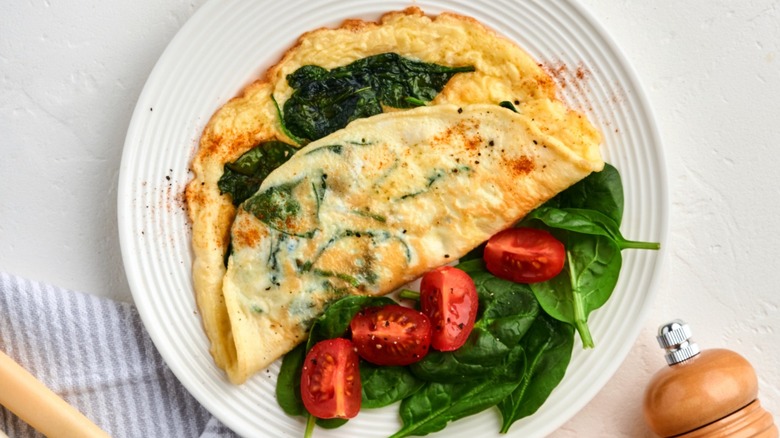 Spinach omelet with cherry tomato