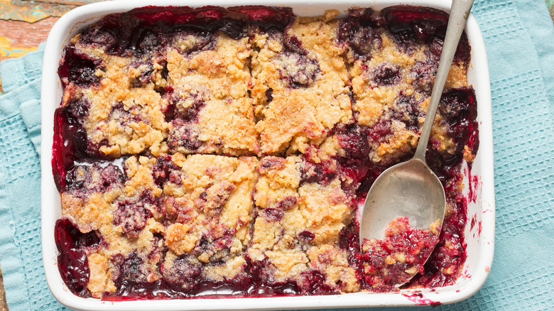 Blueberry dump cake with spoon