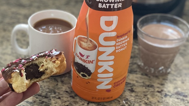 Brownie batter donut beside creamer bottle