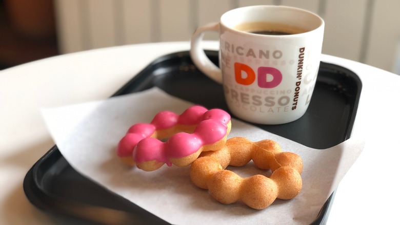 A drink with donut treats