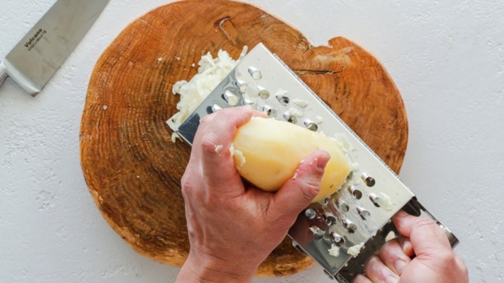 Grating a parboiled potato