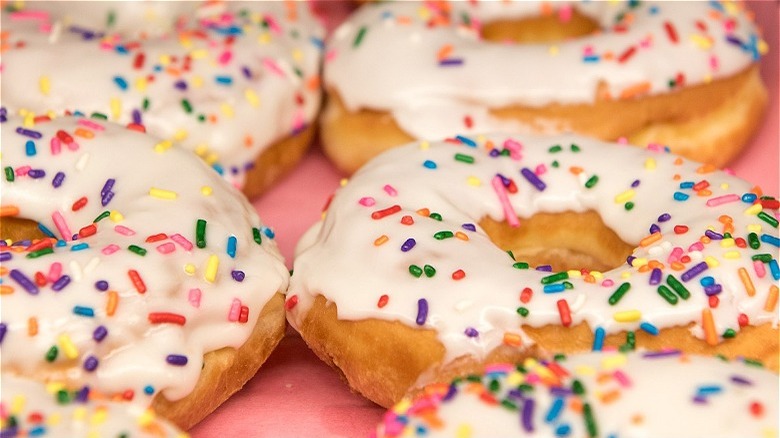 vanilla frosted sprinkles donut 