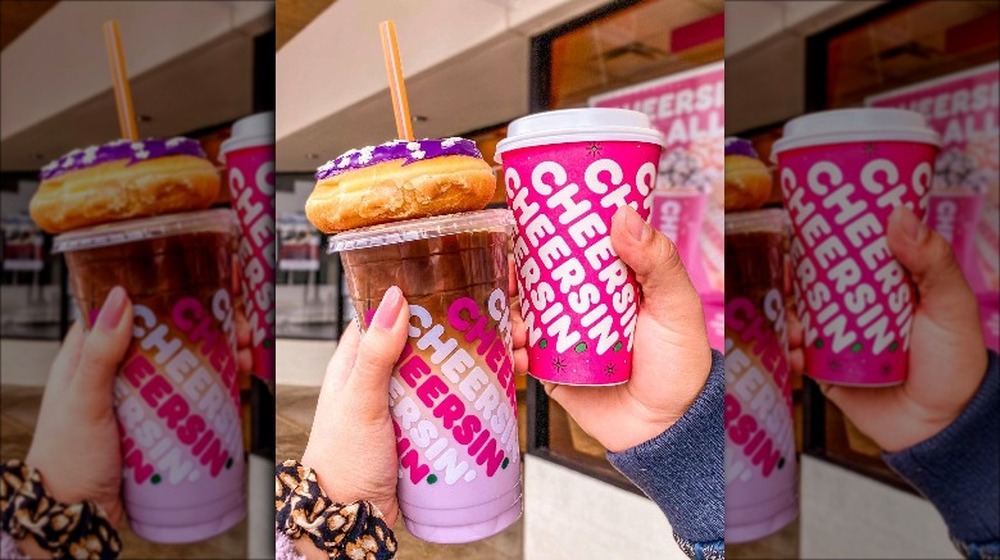 Two Dunkin' drinks and a donut