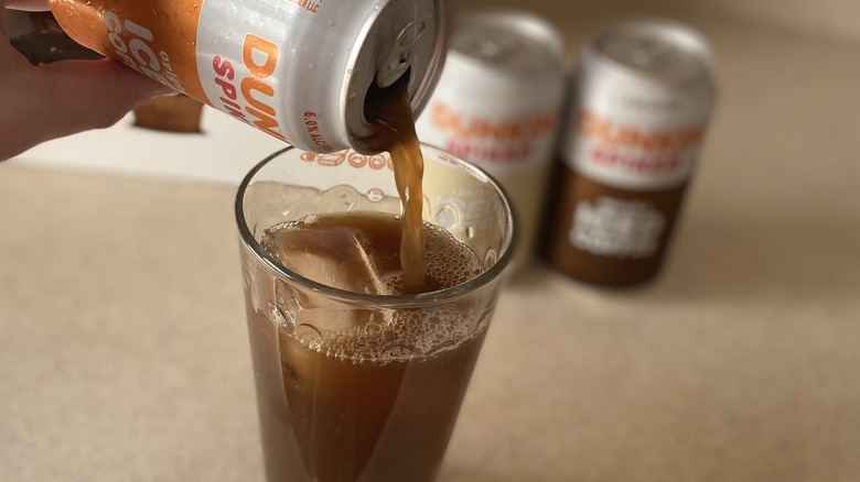 Dunkin' Spiked pouring into glass