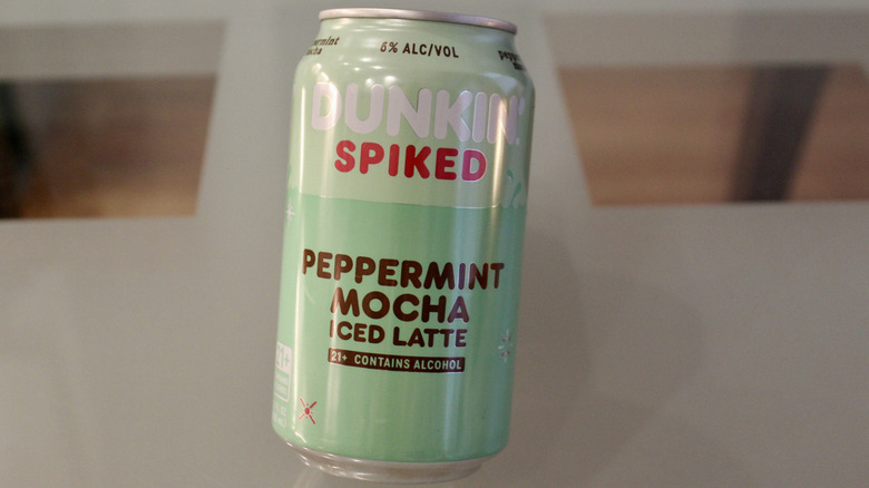 A single can of Dunkin' Spiked Peppermint Mocha Iced latte is shown.