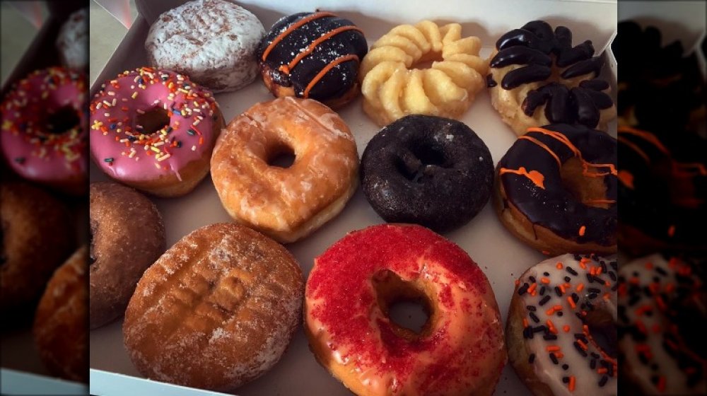 Halloween themed Dunkin' donuts including the Spicy Ghost Pepper Donut