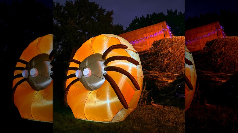 inflatable spider donut illuminated nighttime