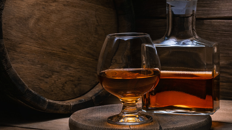 brandy snifter and a barrel