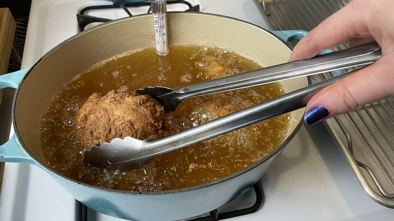 frying chicken in Dutch oven