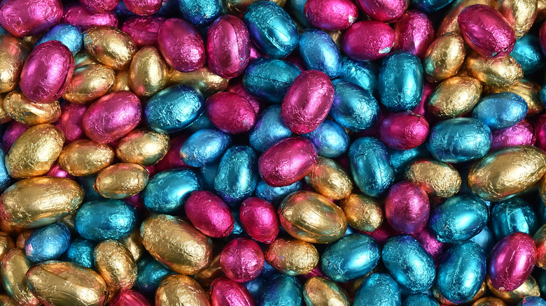 close up of multicolored, foil-wrapped chocolate egg candies