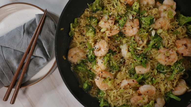 skillet of garlic shrimp and ramen noodles