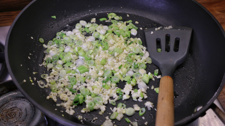 skillet of ginger, garlic, and scallions