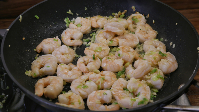 skillet of cooked shrimp