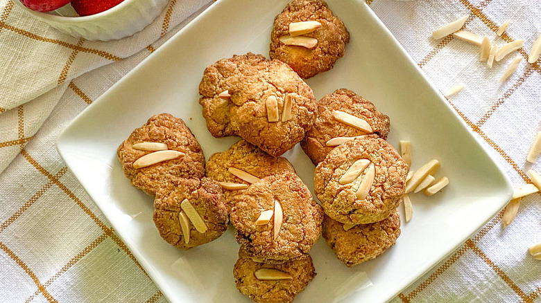 almond cookies on a a cutting board 