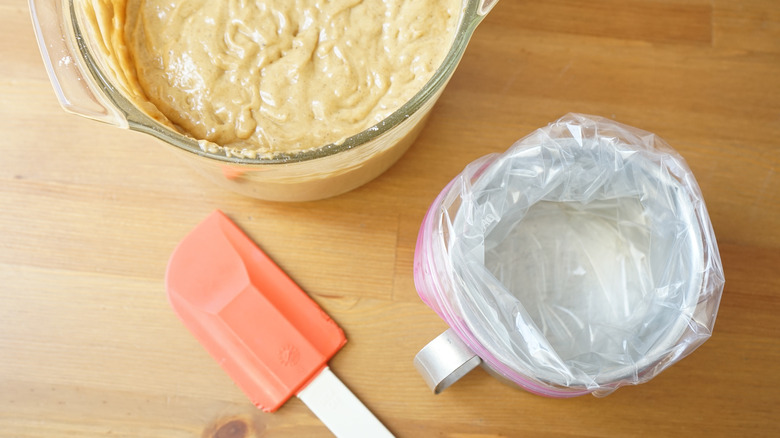 Filling piping bag apple cider donut