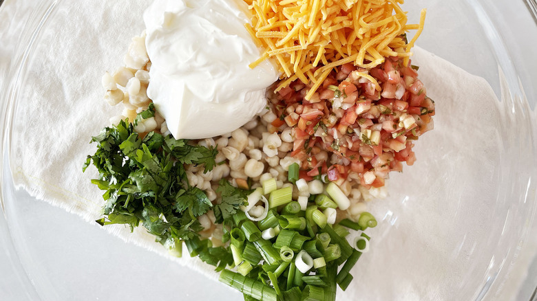 ingredients for hominy casserole in bowl