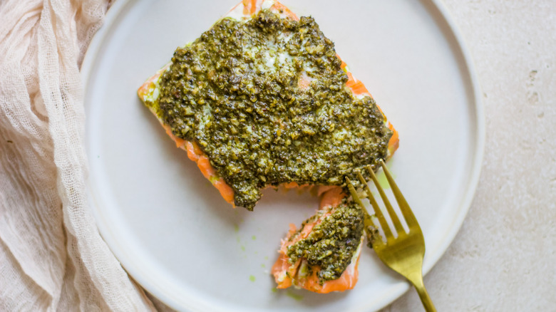 baked pesto salmon on plate