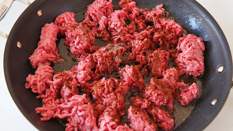 ground beef browning in skillet