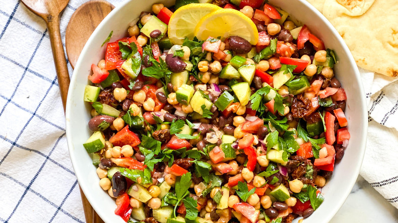 Easy Balela Salad Recipe veggies mixed with dressing 