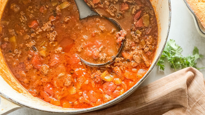 Full pot and small serving of chili 