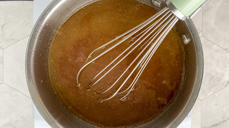 wine and broth mixture in pot