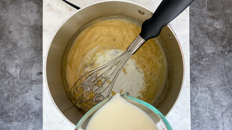 beer and milk in a pan