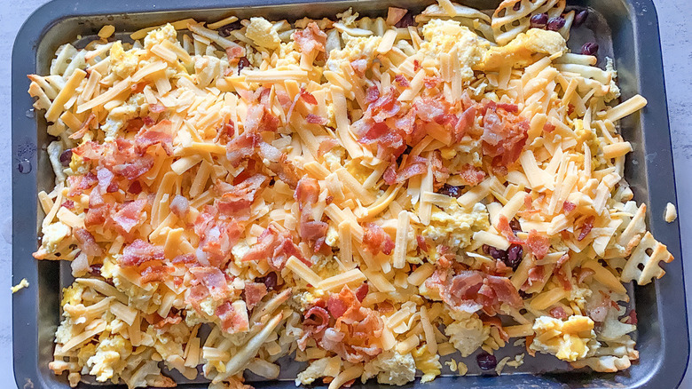 breakfast nachos on baking sheet