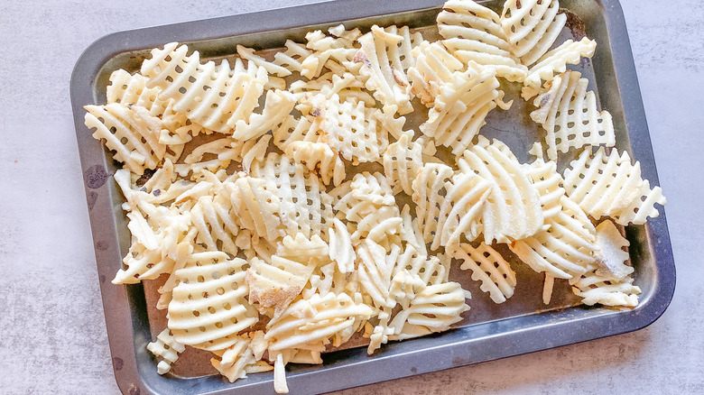 frozen waffle fries on pan