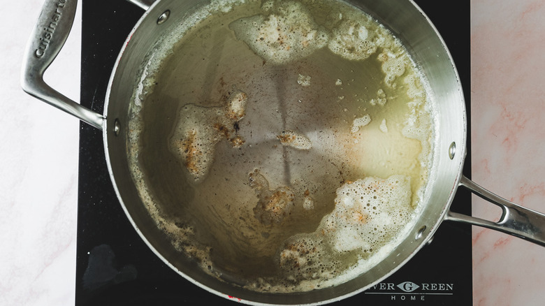 butter melted in pan