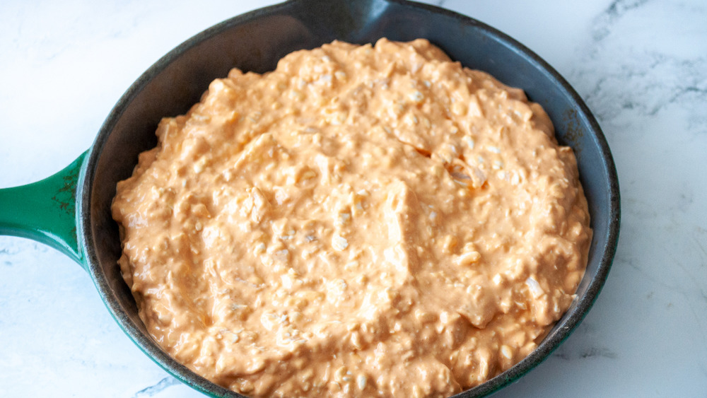 Easy buffalo chicken dip resting in pan