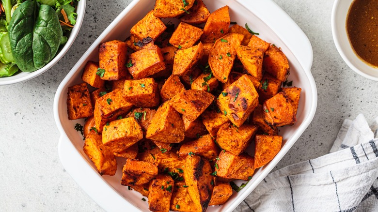 Casserole dish with roasted sweet potatoes