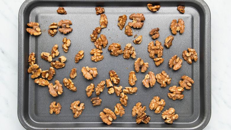 walnuts on baking sheet