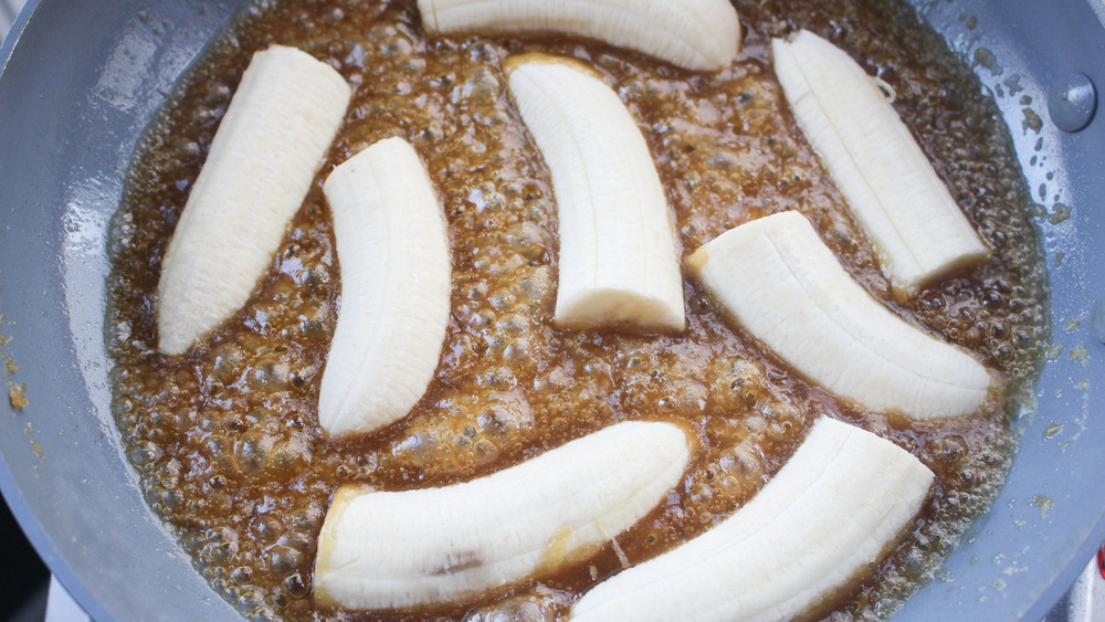 easy caramelized bananas cooking in caramel