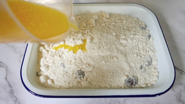 melted butter poured over white cake mix