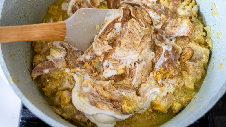 sauce covered chicken in pot