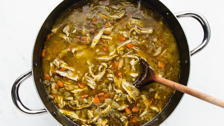 Chicken soup in pot