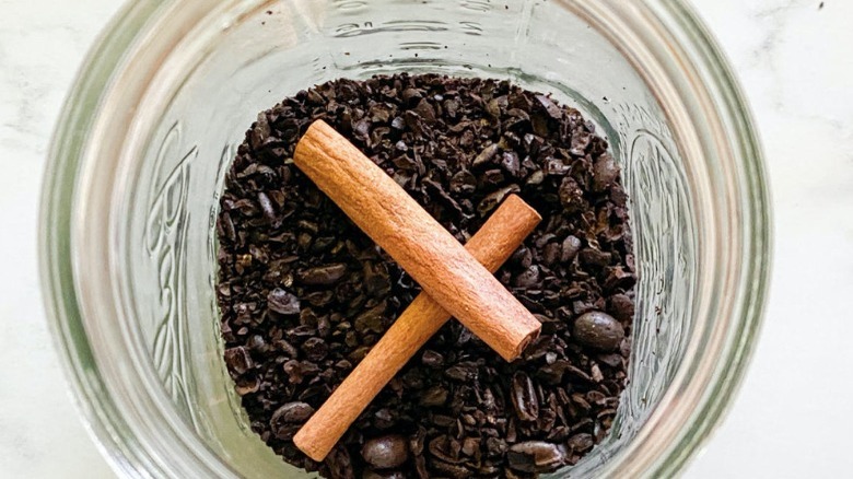 ground coffee with cinnamon sticks