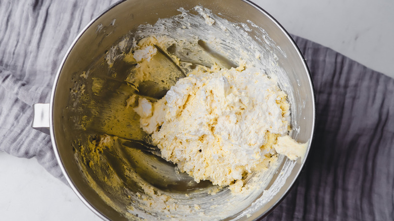 cool whip and lemon cake mix in bowl